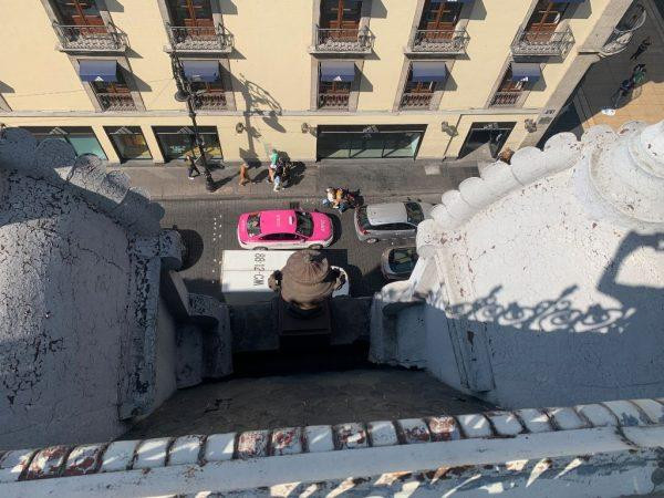 View of the street from the rooftop cafe atop the Museo Del Estanquillo, showcasing the urban landscape