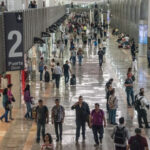 Passengers at Benito Juarez International Airport in Mexico City