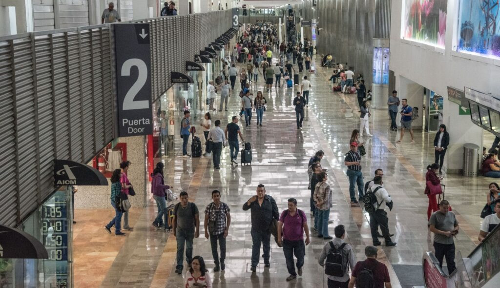 Passengers at Benito Juarez International Airport in Mexico City