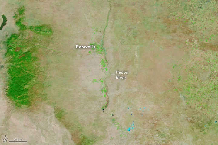Satellite images comparing the Roswell area on October 14, 2024 (left) and October 21, 2024 (right), highlighting floodwater in dark blue
