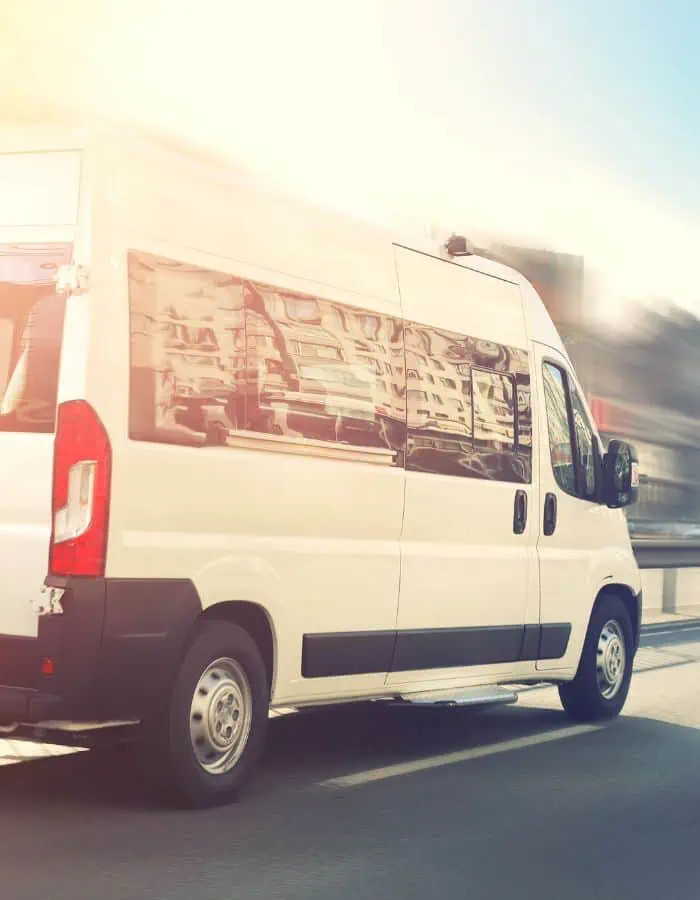 A white shuttle van