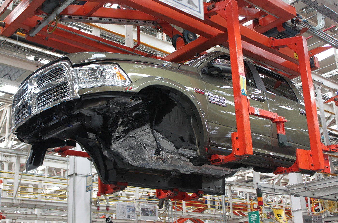 A Hemi-powered RAM 2500 moves along the assembly line at the FCA Saltillo Truck Assembly Plant. Opened in 1995, the plant launched production of the heavy duty in 2009; via RAM Trucks.