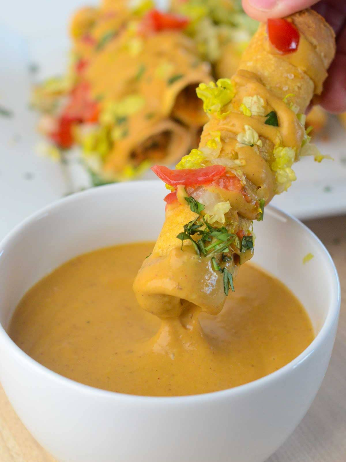 Vegan taquitos with black bean and corn filling