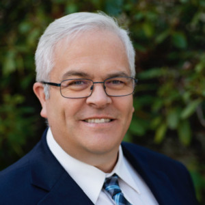 Dr. Neil Woolf, the newly appointed president of New Mexico Highlands University, brings extensive higher education administrative experience to the role