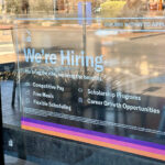 Hiring notice at Taco Bell in Las Cruces indicating job availability