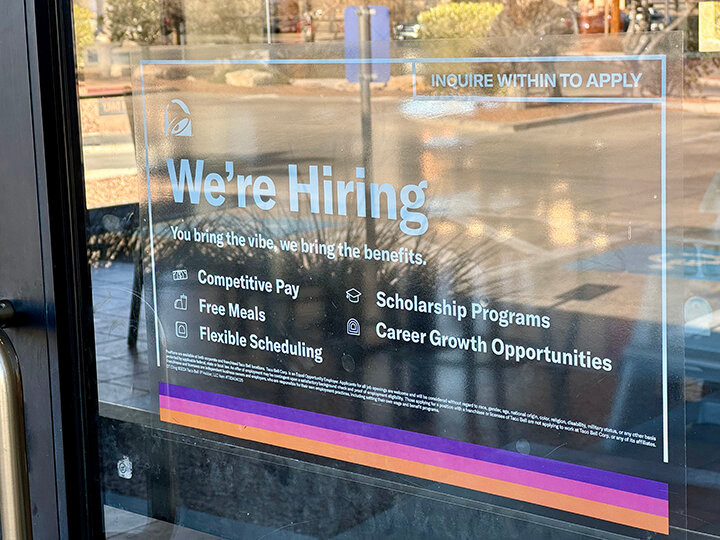 Hiring notice at Taco Bell in Las Cruces indicating job availability