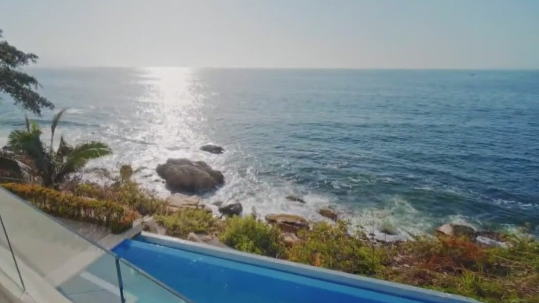 Puerto Vallarta, Mexico, a popular destination for American expats, showcasing a vibrant coastal city with beautiful beaches, lively nightlife, and a thriving LGBTQ+ scene