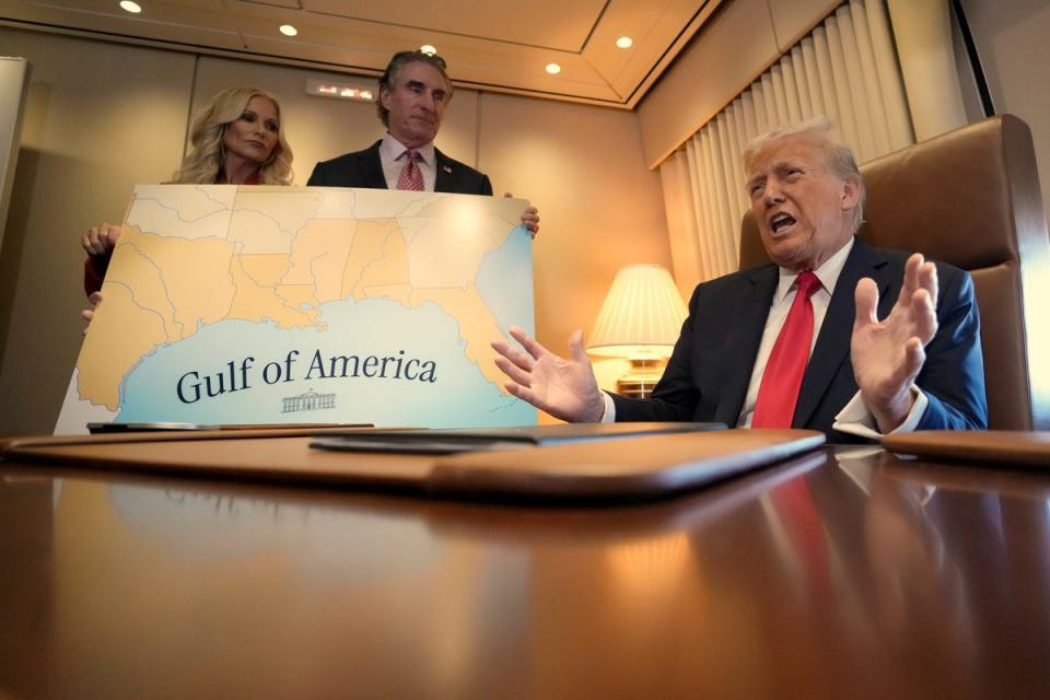 President Donald Trump, from right, speaks to reporters accompanied by Interior Secretary Doug Burgum and Burgum