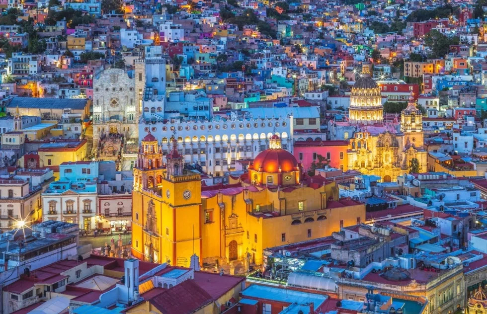 Colorful buildings in Guanajuato, Mexico, reflecting the strong dollar's value