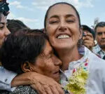 Claudia Sheinbaum smiling during a campaign rally
