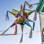 traditional-piñata-hangs-between-two-buildings-during-christmas-in-mexico-city