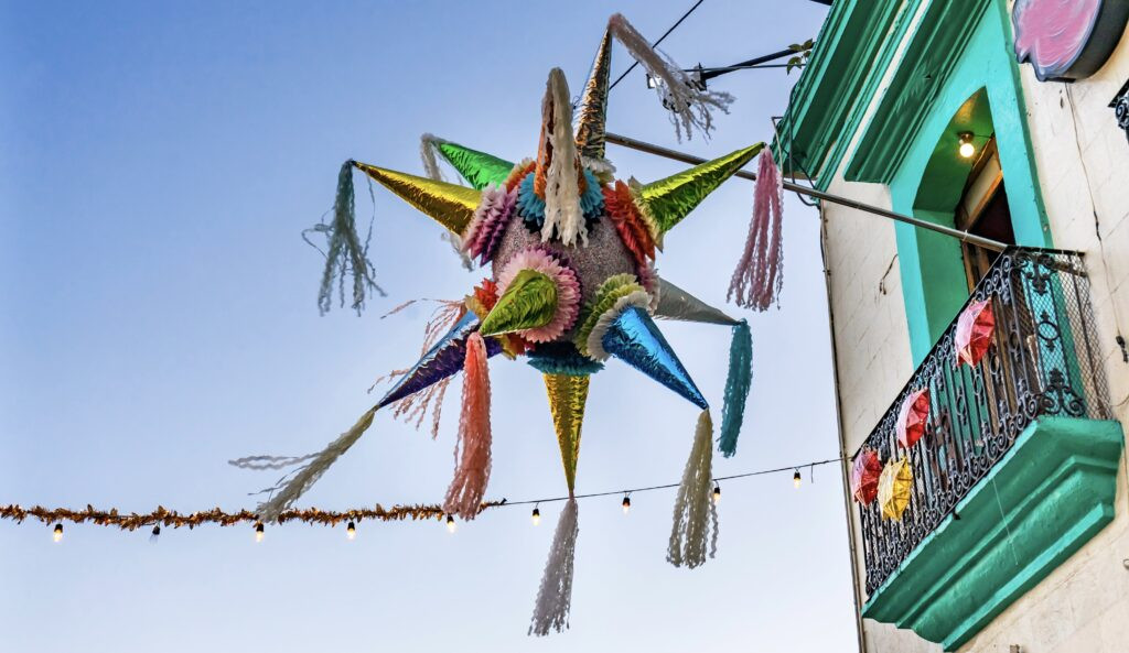 traditional-piñata-hangs-between-two-buildings-during-christmas-in-mexico-city