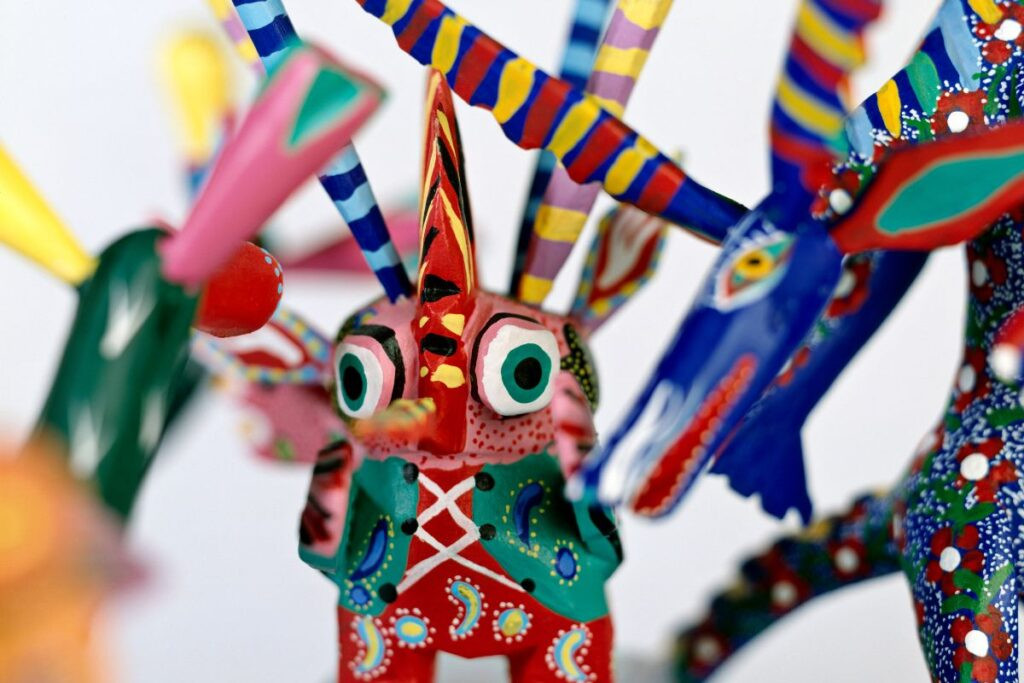 A collection of Alebrijes sculptures, showcasing vibrant and imaginative designs