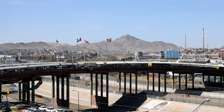 A car driving across the US-Mexico border