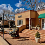 Canyon Road Galleries in Santa Fe New Mexico with colorful buildings and art displays