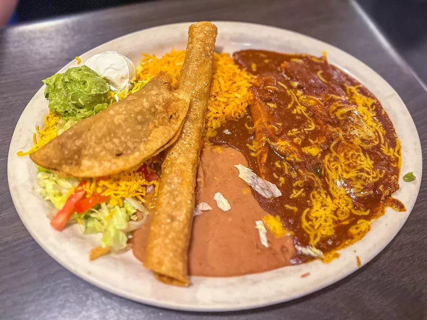 A close-up of Blanca's plate at Casa Navarro, featuring a delicious combination of Tex-Mex dishes with fresh ingredients