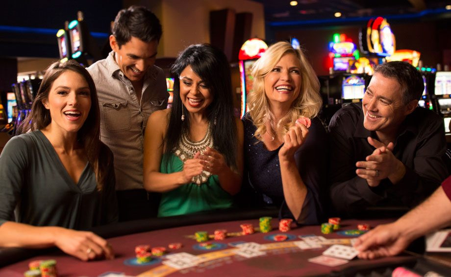 Casino floor at Inn of the Mountain Gods, featuring slot machines and gaming tables.