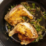 Chicken pieces seasoned and ready to sear.