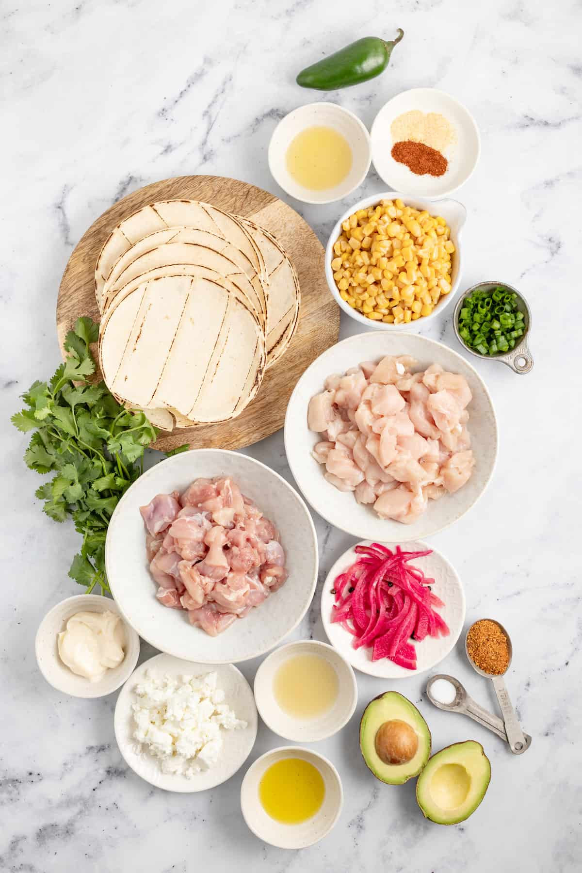 various healthy street taco fillings including grilled chicken, fish, and vegetables