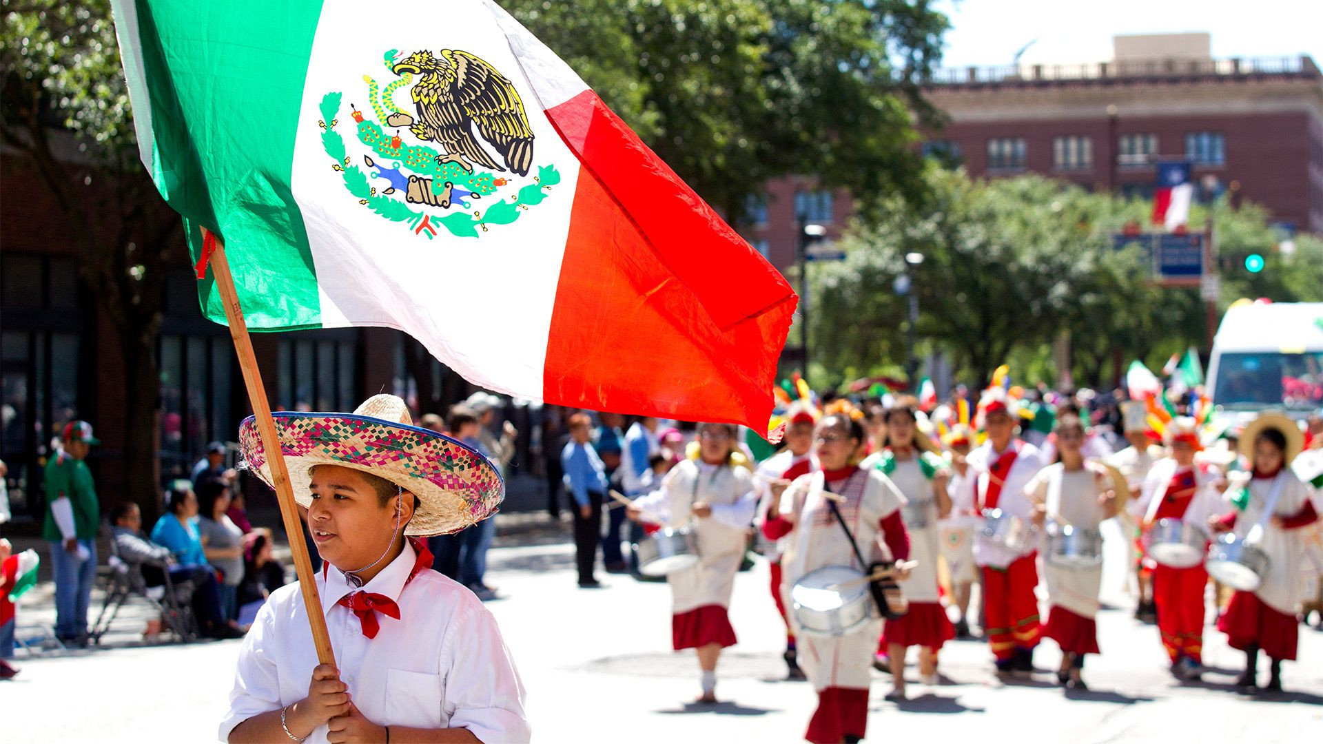 Mexican flags waving, symbolizing national pride and resistance