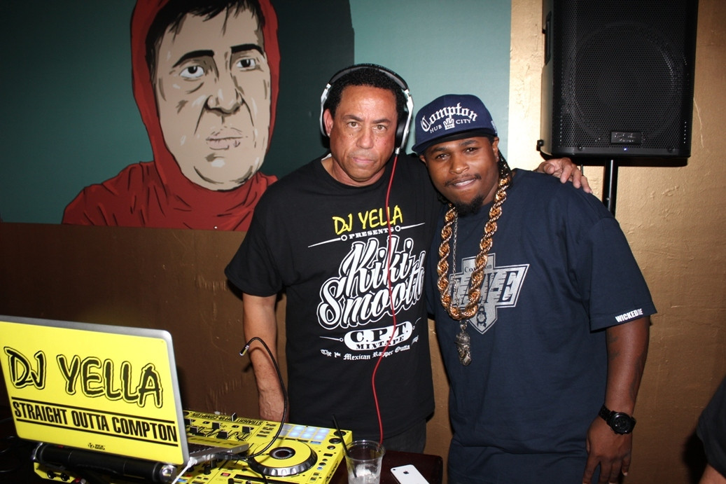 DJ Yella and Lil Eazy-E performing at Amor Y Tacos