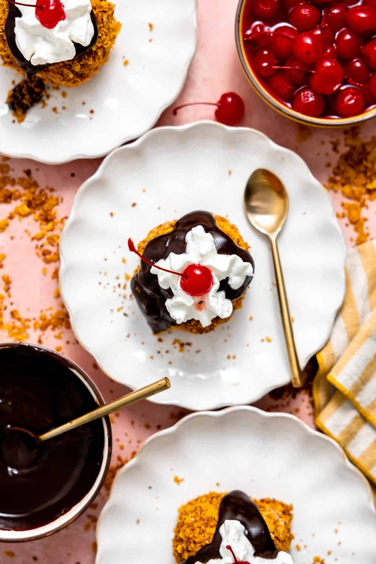 Overhead of Mexican Fried Ice Cream served on plates. 