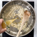 Pouring broth into rice pot