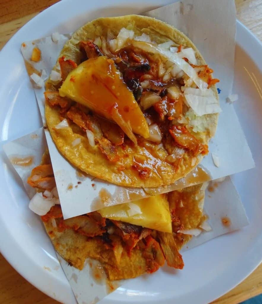 Corn tortillas, a staple of Mexican cuisine, showcasing the importance of corn.