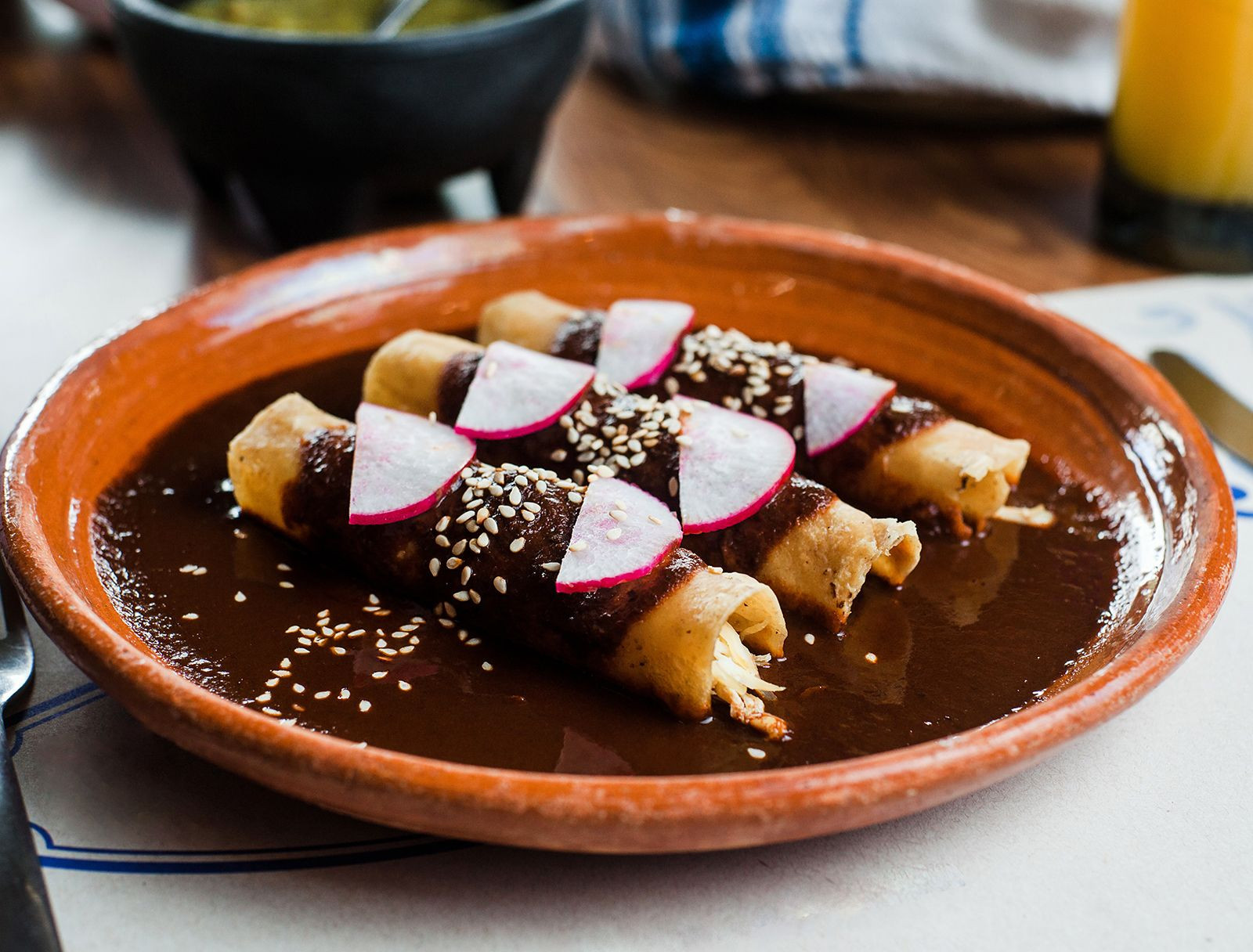 Chicken enmoladas covered with mole poblano