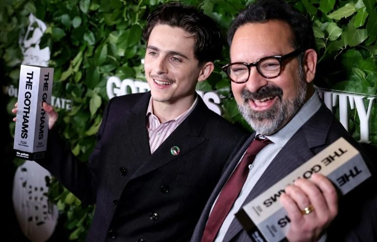 Director James Mangold with Timothée Chalamet at an awards ceremony, highlighting the collaborative effort behind &quot;A Complete Unknown&quot;