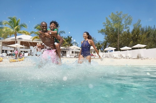 Family enjoying a sunny day on a Mexico cruise, highlighting the joy and relaxation of the vacation.