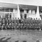 Brazilian Military President Emilio Garrastazu Médici holding the Jules Rimet trophy with national team members, symbolizing the regime's influence on the 1970 World Cup victory.