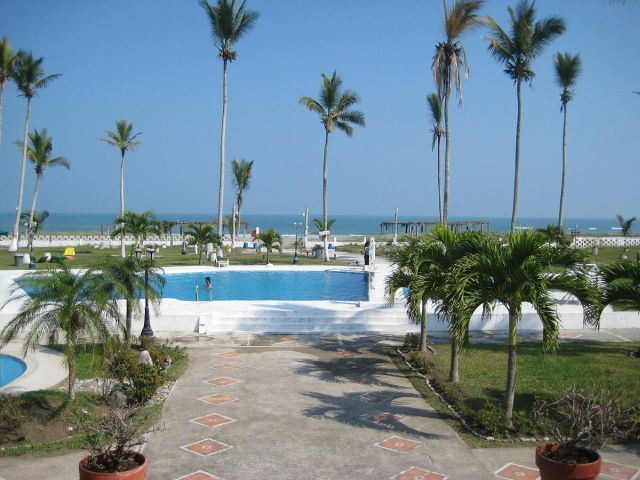 A serene beachfront hotel in Tecolutla, Veracruz, offering guests a relaxing and luxurious stay with breathtaking ocean views and easy access to the beach.