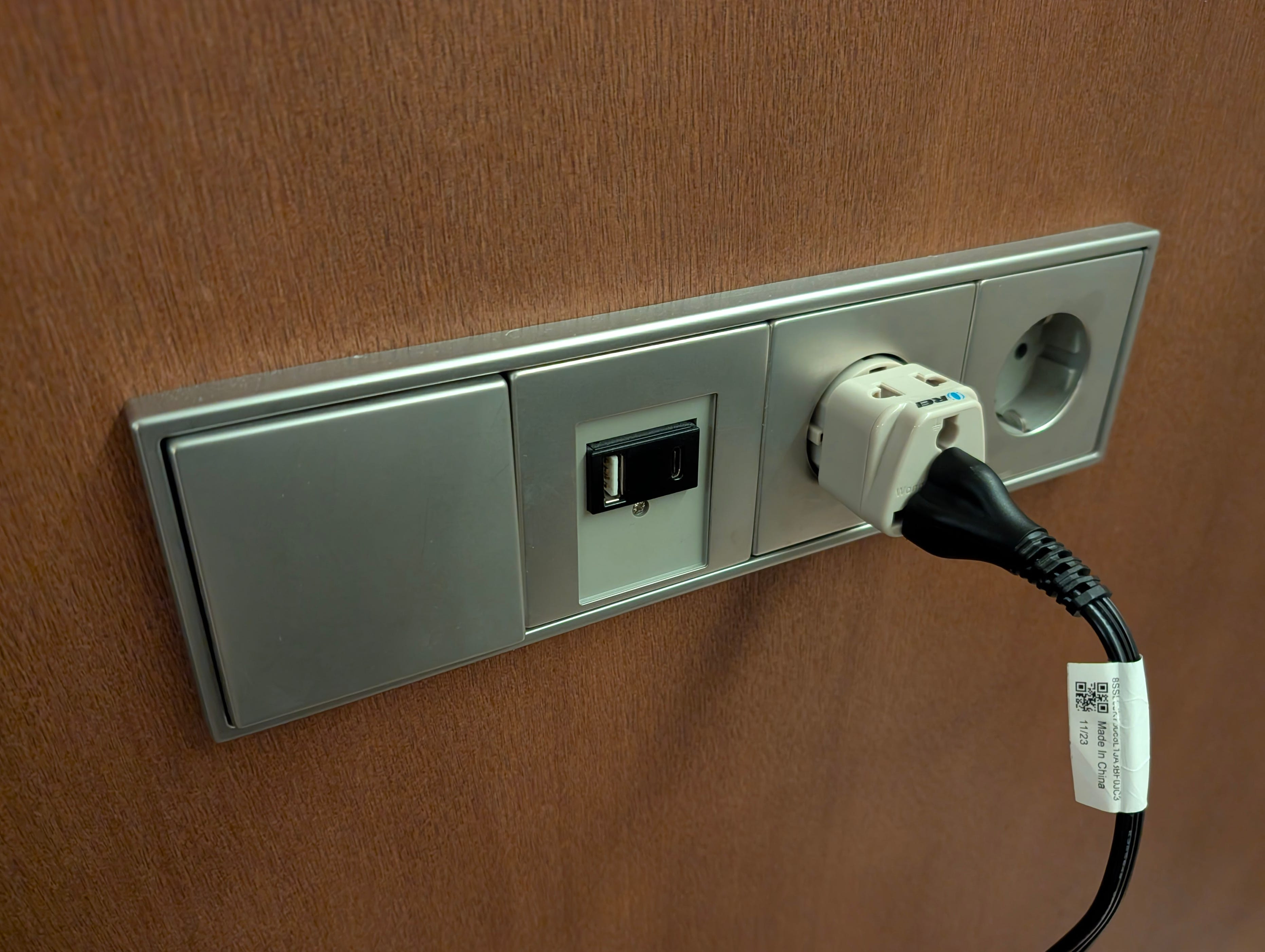 Close-up of a power adapter suitable for use in Europe, different from Mexico