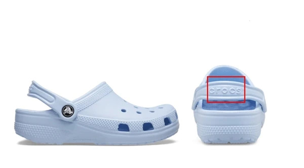 Genuine Crocs feature adjustable straps with the Crocs logo.