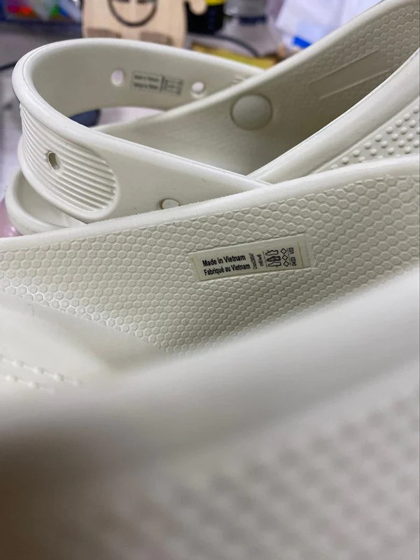 High-soled Crocs may have origin information inside the shoe.
