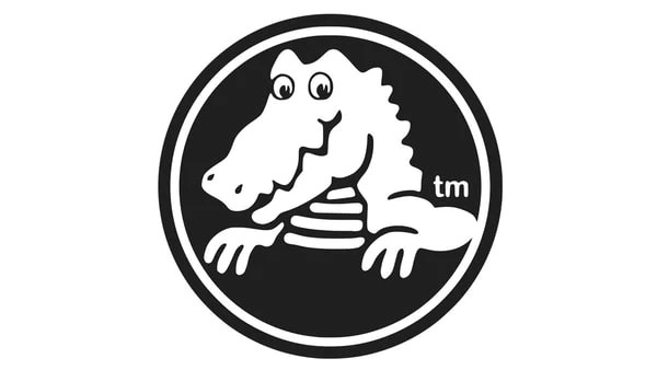 Close-up of the Duke crocodile logo on Clog Classic products.