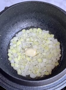 Frying onions and garlic for Mexican rice