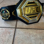 Sean O'Malley with the Mexican Flag on his UFC Championship Belt