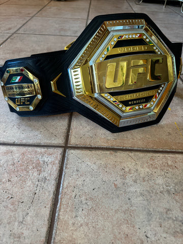 Sean O'Malley with the Mexican Flag on his UFC Championship Belt