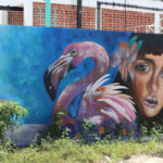 Vibrant street art in Puerto Morelos, Mexico, enhancing the town's colorful and inviting atmosphere