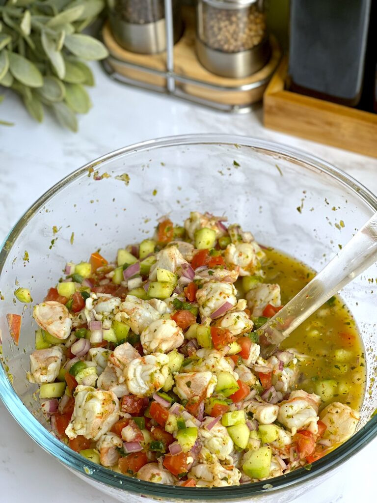 Close-up of shrimp being &quot;cooked&quot; in lime juice for ceviche
