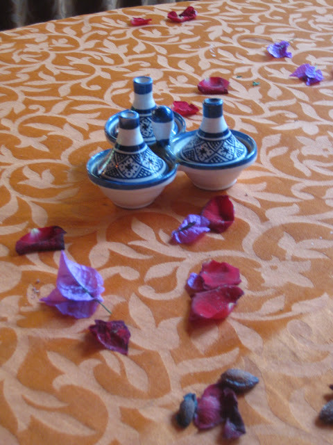 Three mini tagines containing cumin, salt, and black pepper in Morocco