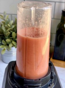 Tomato juice being blended for Mexican rice