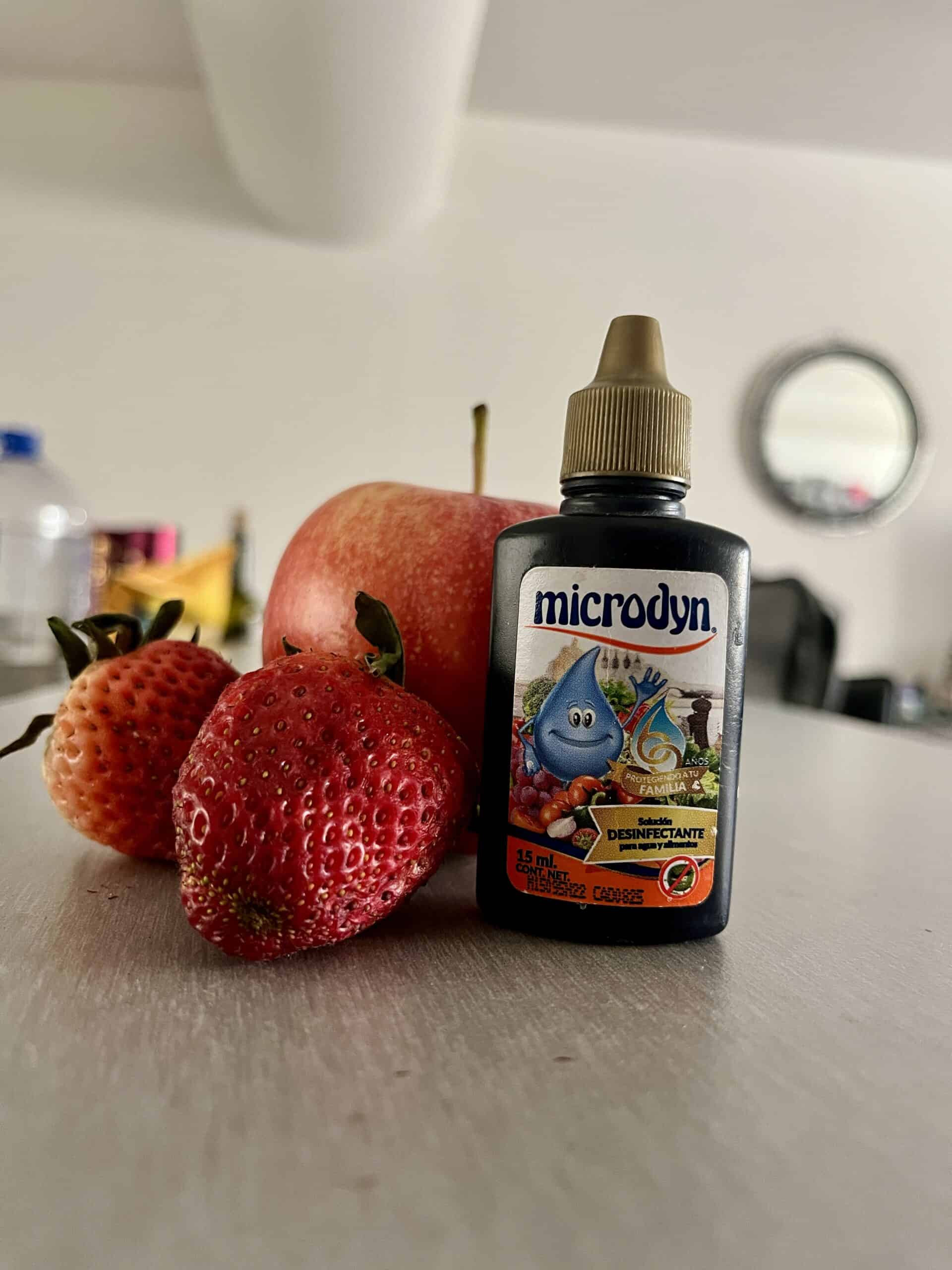 microdyn drops by 2 red strawberries and an apple