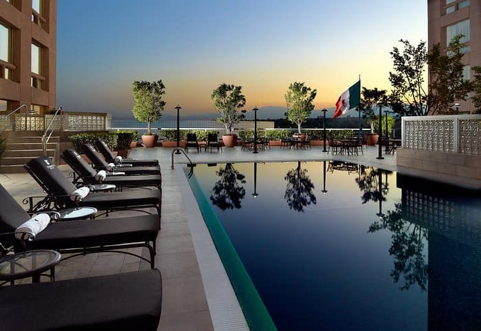 The JW Marriott Hotel with its inviting pool, perfect for a luxurious stay in Polanco