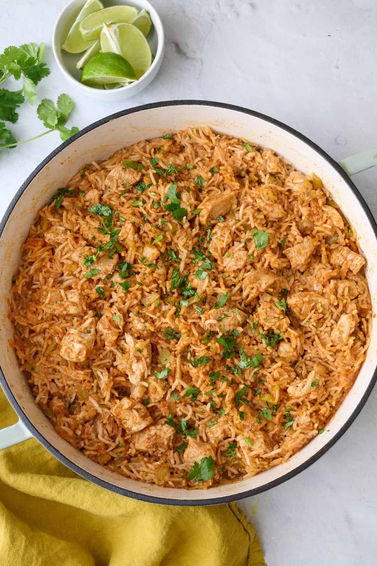 Mexican chicken and rice served with cilantro and lime
