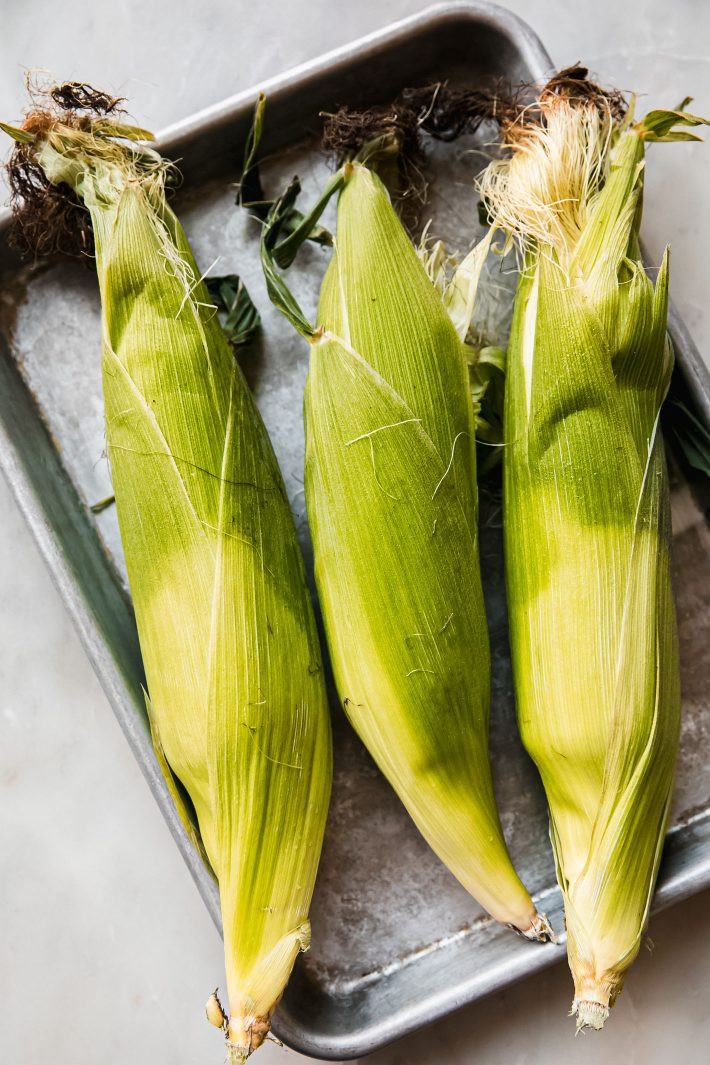 Grilled corn on the cob, ready for elotes seasoning