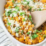 Mexican street corn recipe off the cob in a white bowl.