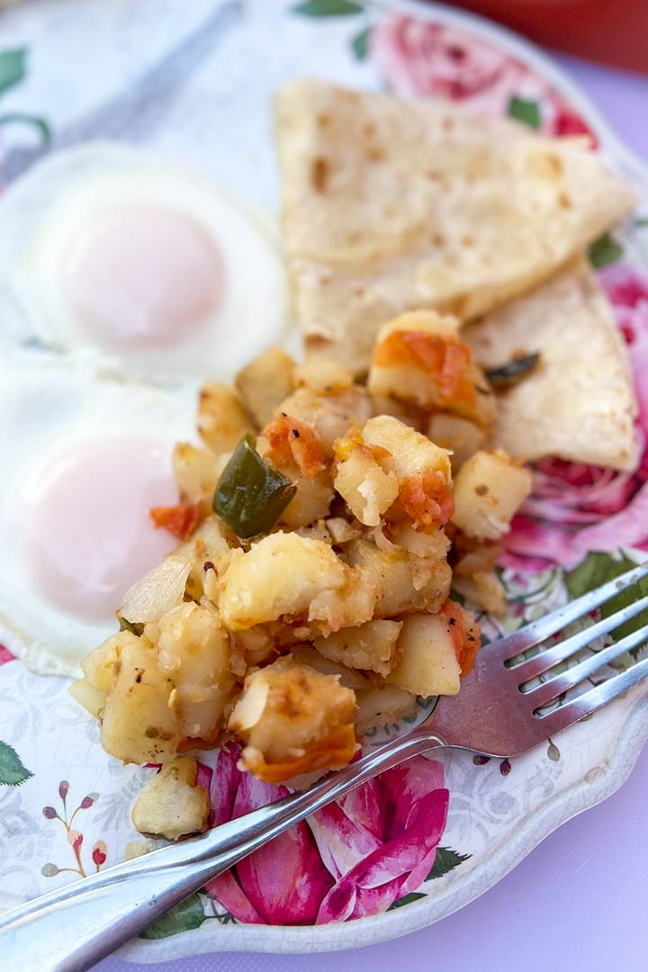Papas a la Mexicana served with eggs and tortillas